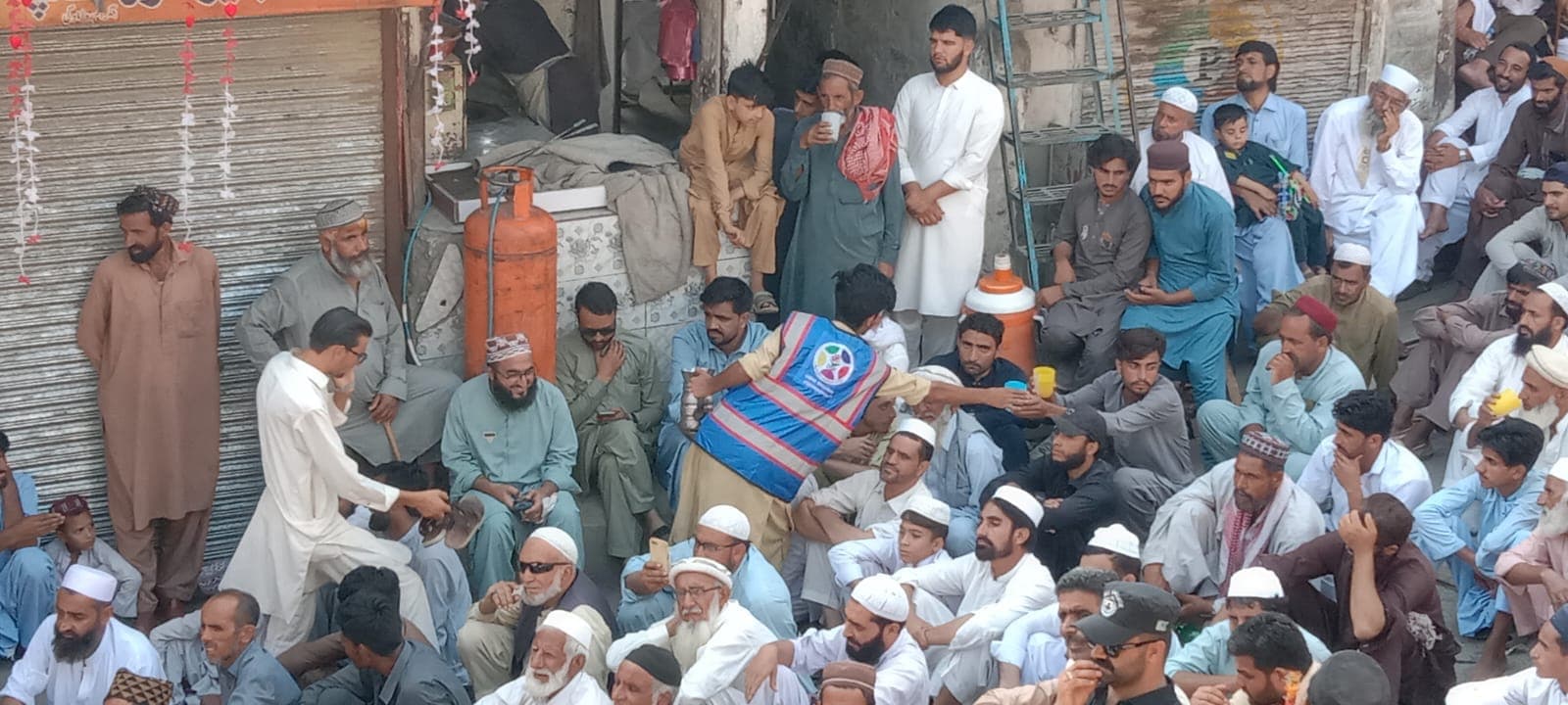 Free drinking water served to participants of the Eid Milad-un-Nabi (PBUH) procession.