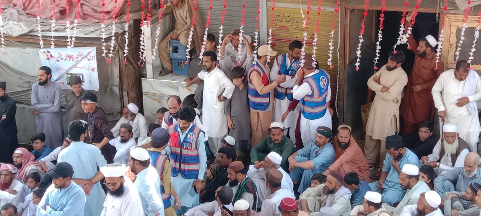 OWF volunteers at the sabeel set up for the Eid Milad-un-Nabi (PBUH) celebrations.