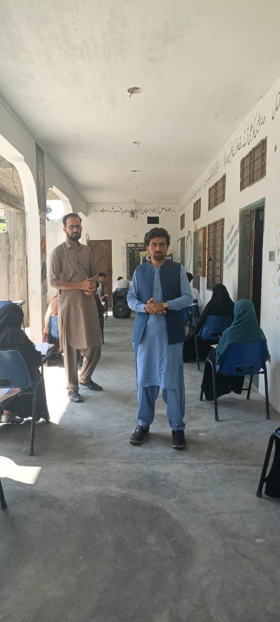Orphans and students from low-income families sitting the entry test for OWF's fully funded scholarship.
